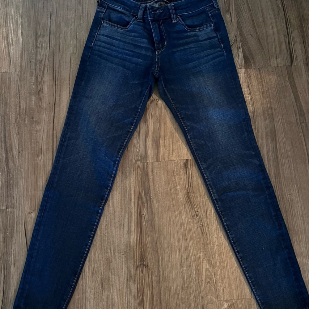 AMERICAN EAGLE SUPER SUPER STRECH X4 SIZE 4